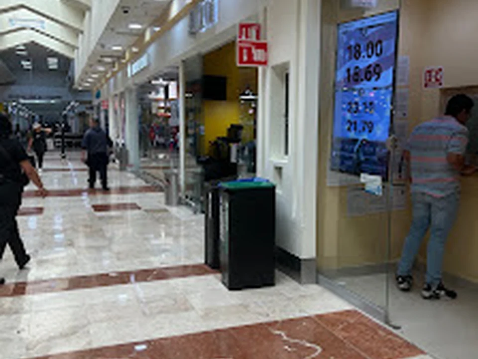 EXE Centro Cambiario